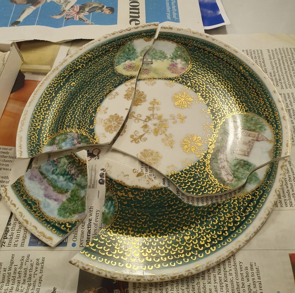 Broken Painted Plate